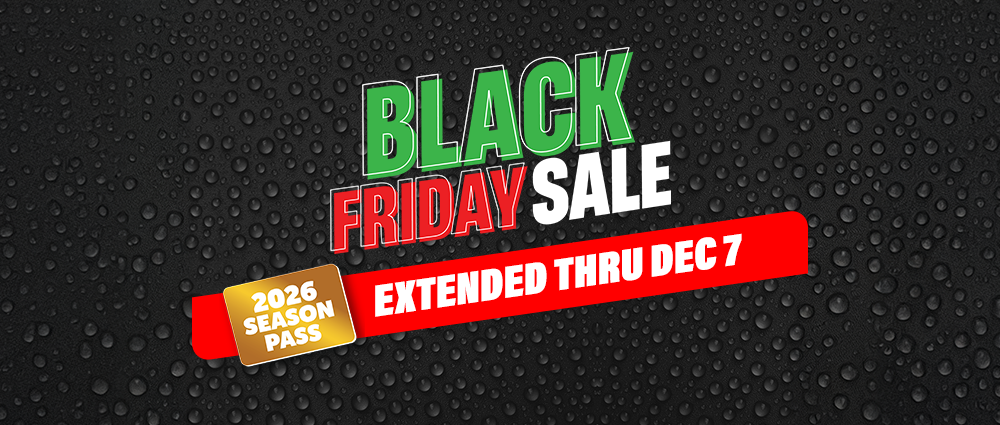 Boy swimming underwater in wave pool