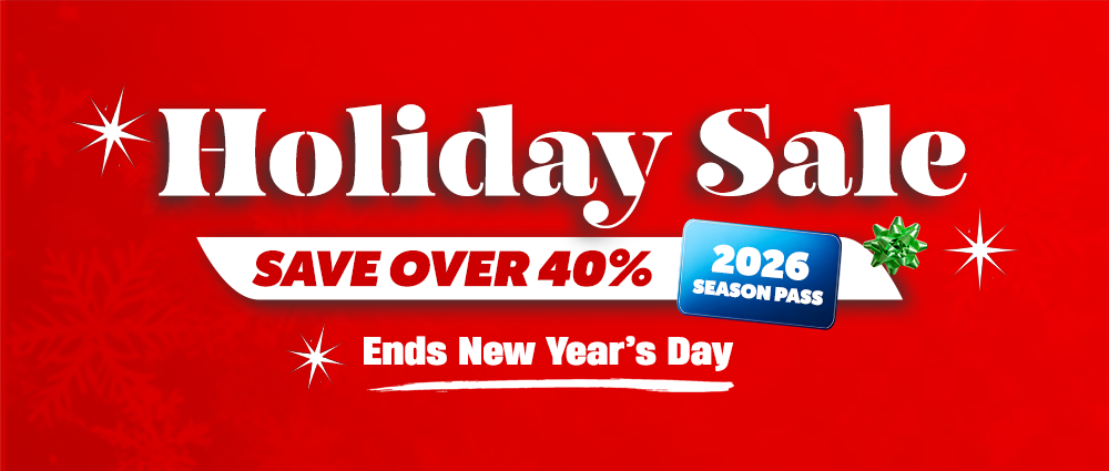 Boy swimming underwater in wave pool