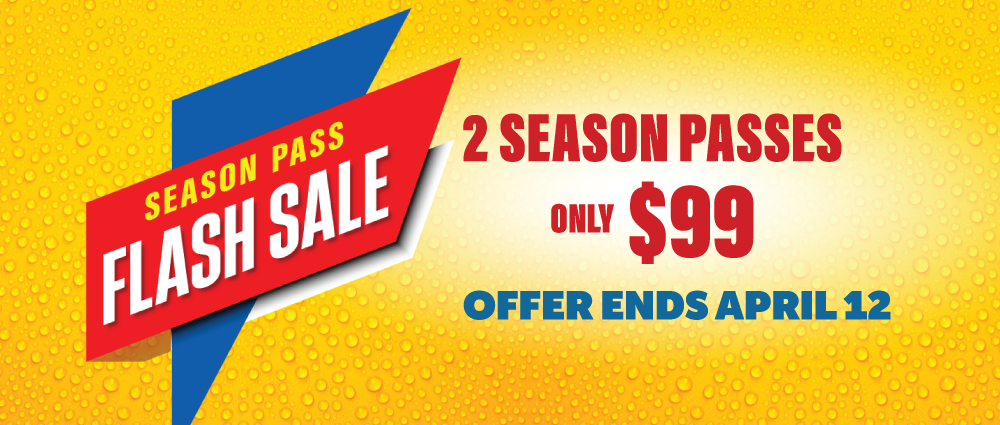 Boy swimming underwater in wave pool